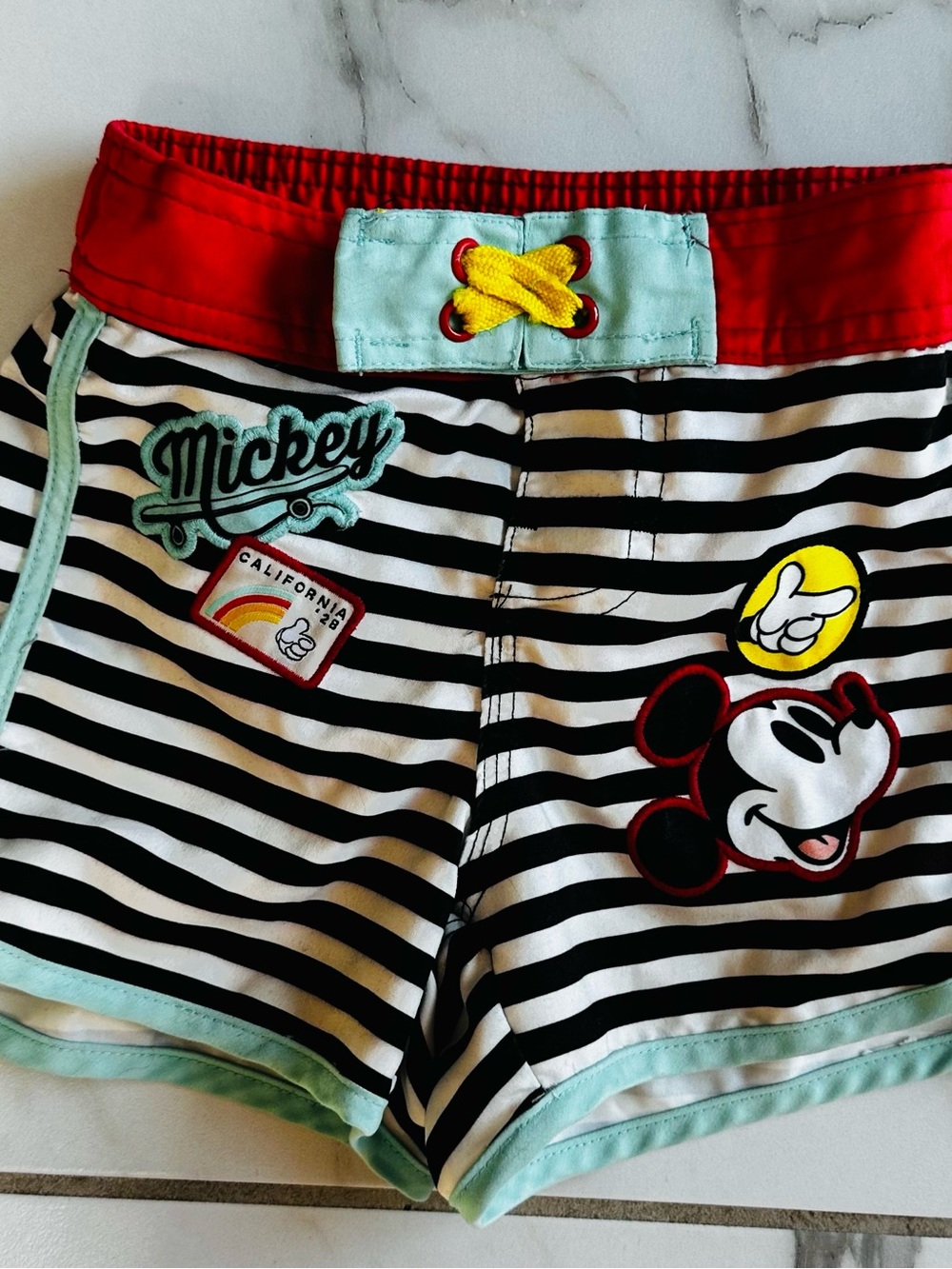 Disney Red & White Kids Swim Shorts with Black Stripe Detail